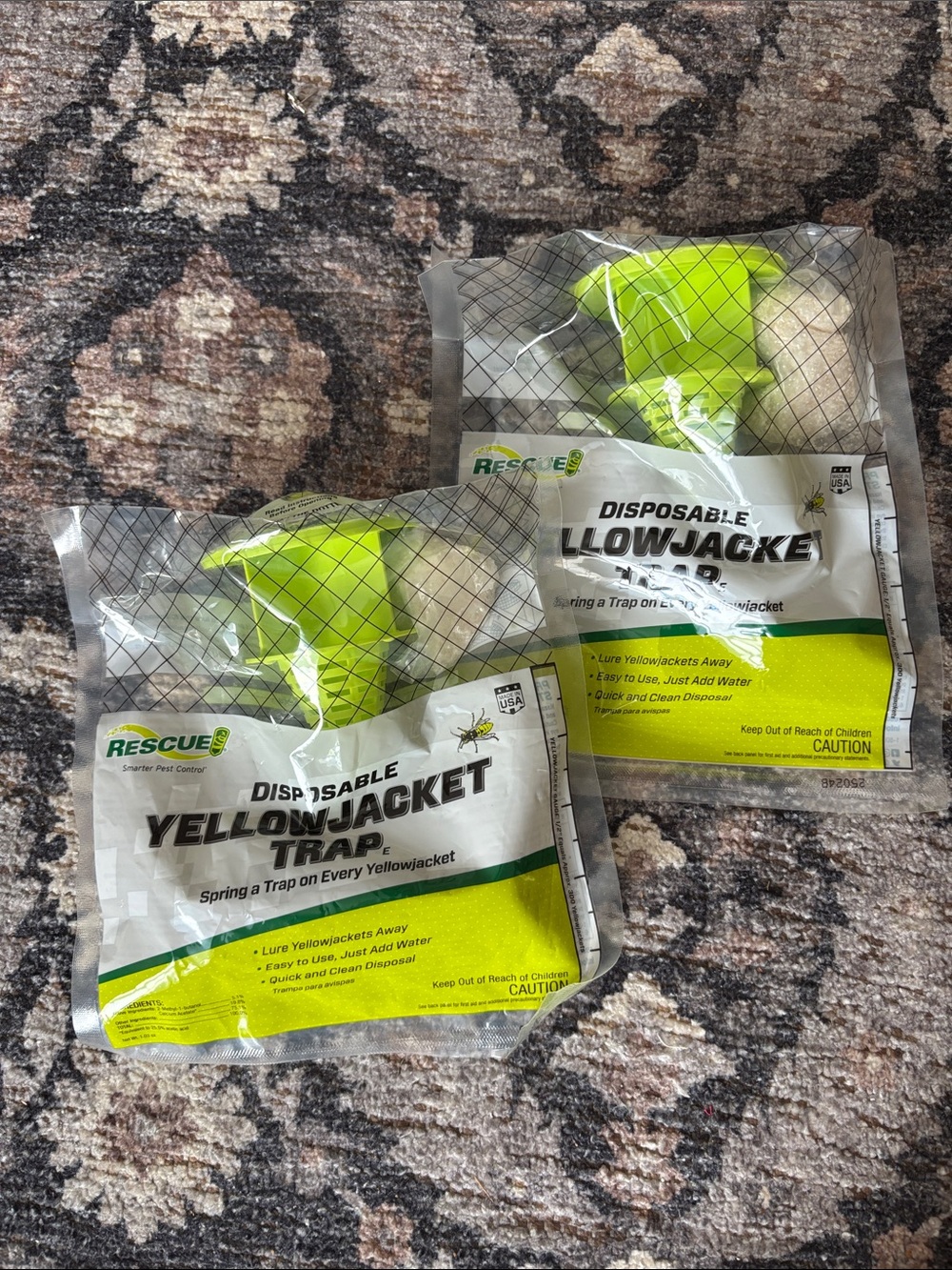 Two disposable yellow jacket traps